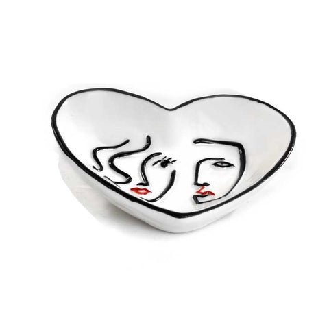 svuotatasche a forma di cuore in porcellana con decoro viso
