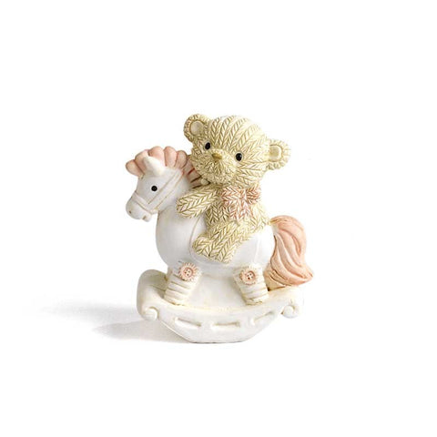 ORSETTA CON CAVALLO DONDOLO ROSA 5.4 CM IN RESINA
