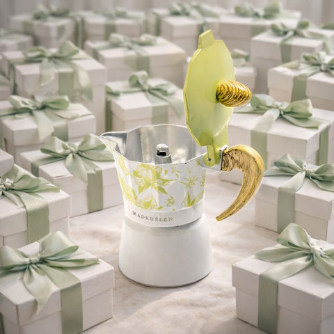 Caffettiera Madrhélen Linea Flora con decorazioni floreali e manico giallo-verdastro