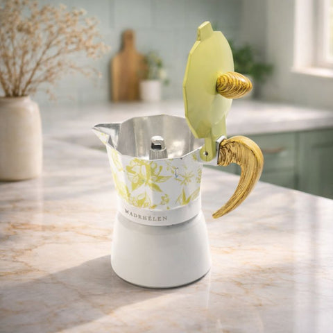 Caffettiera Madrhélen Linea Flora con decorazioni floreali e manico giallo-verdastro