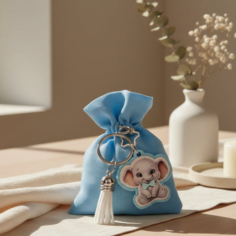 sacchetto nascita bimbo celeste con portachiavi elefantino e nappina bianca bomboniera battesimo bambino 8x10 cm